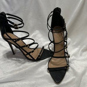 Black buckled heels